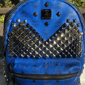 MCM Stark Leather x Studs Royal Blue Backpack, Luxury, Bags & Wallets on  Carousell